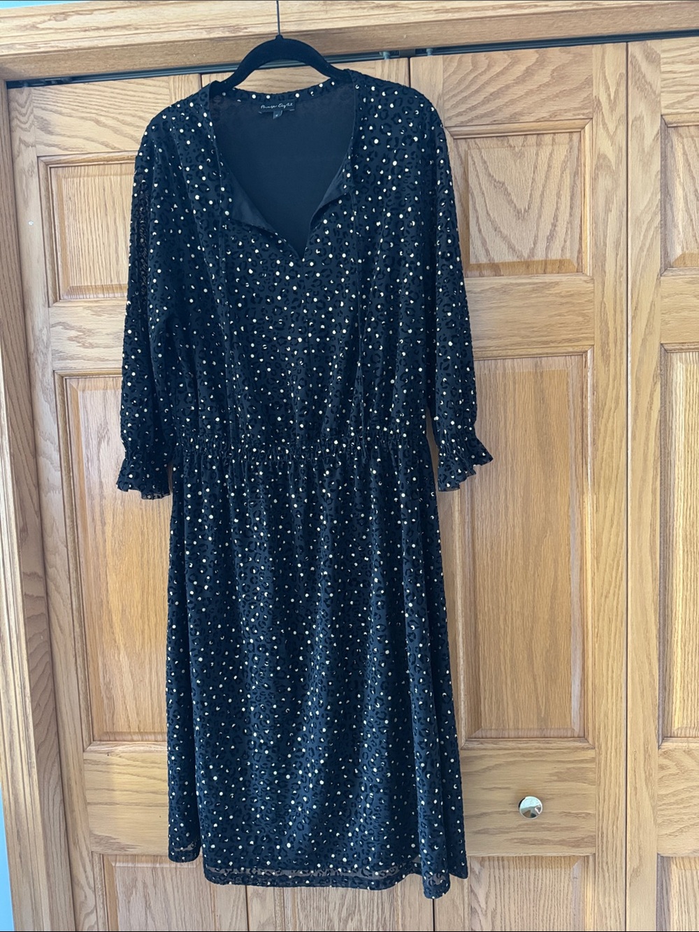 Phase Eight Black Midi Dress with subtle animal print design